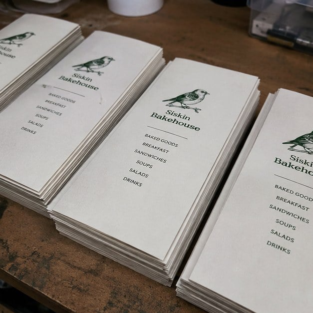 Restaurant menus with logo — customer photo